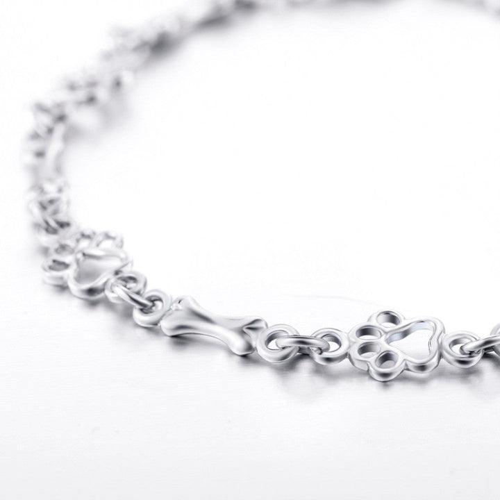 Bracelet with Dog Paw and Bone Charms Made of Pure Silver