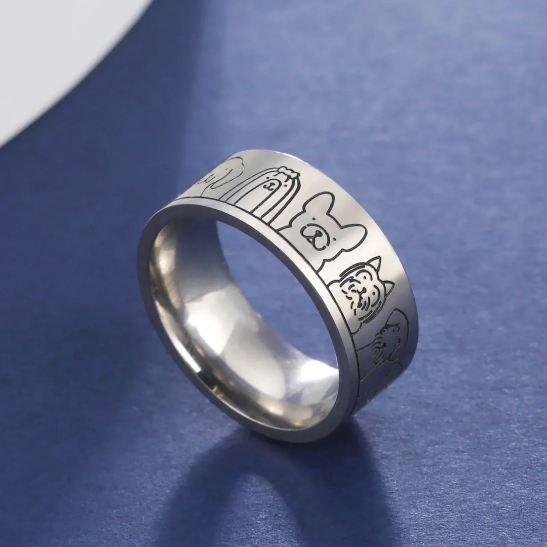 Wide Stainless Steel Ring with Dog Motifs – Engraved Design for Women